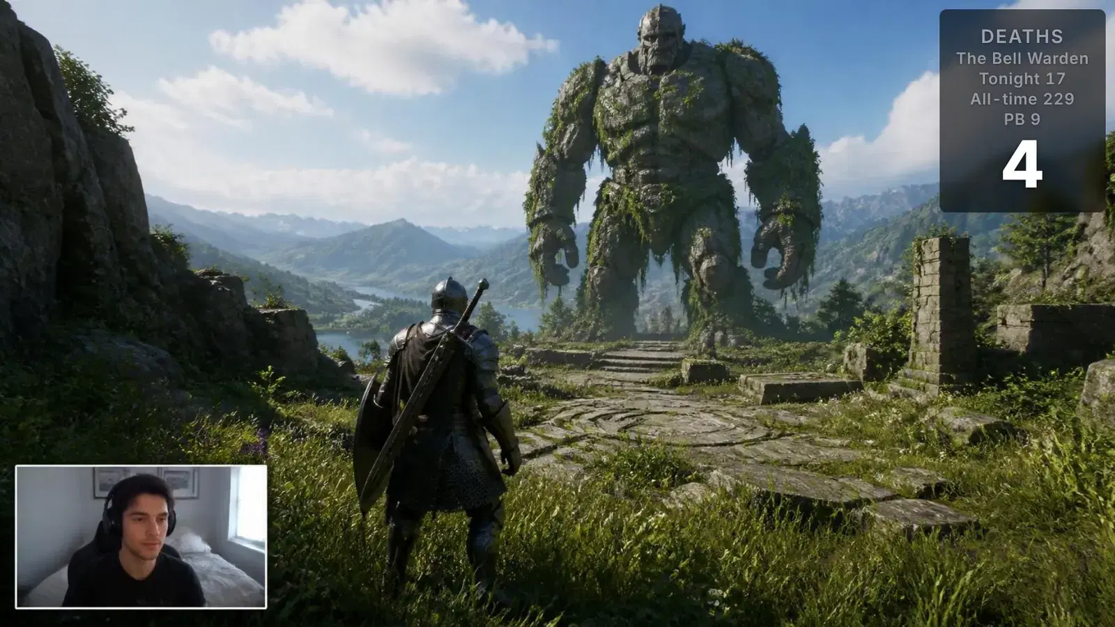 An action RPG stream in daylight: a knight facing a giant stone golem, a facecam in the bottom-left, and a death counter in the top-right showing the boss name, tonight’s count, the all-time total and a personal best.